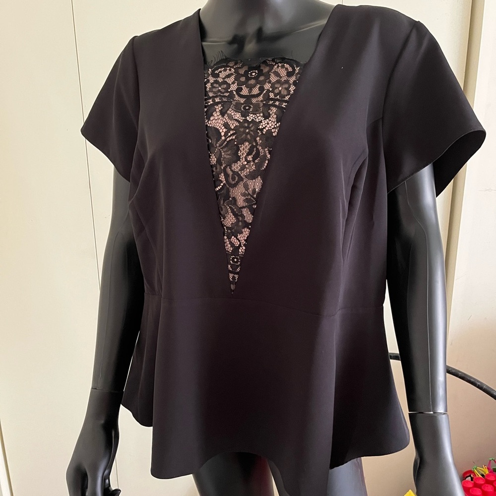 Lane Bryant blouse size 18. Color black.